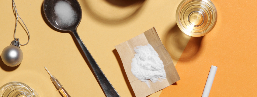 Explore why does meth cause acne through an image of powderized meth along with drug paraphernelia.